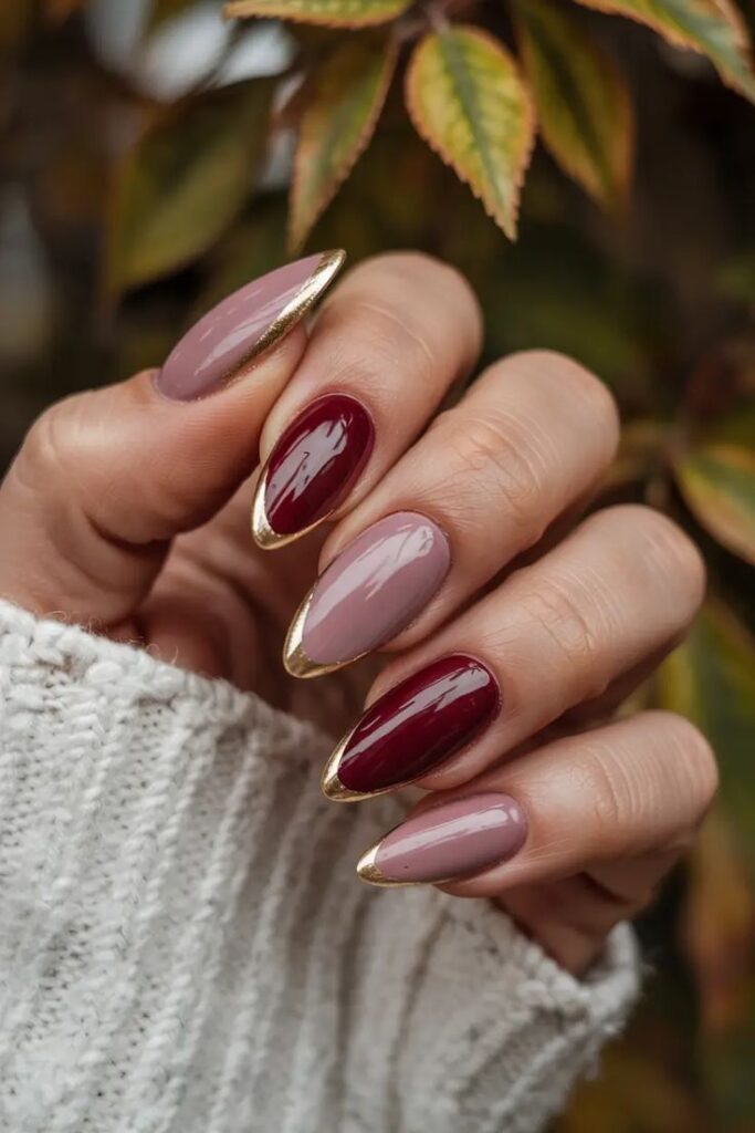 Burgundy and Mauve Almond Nails with Gold Tips