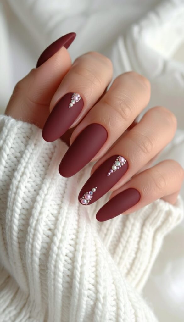 21 Christmas Nails Acrylic Ideas for 2025: Holiday Glam, Gen Z Style 13 Matte Black Cherry with Jeweled Garland